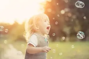 Little boy and soap bubbles